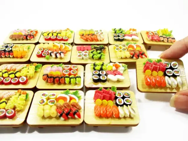 Four boards with miniature sushi variety; dollhouse kitchen display food