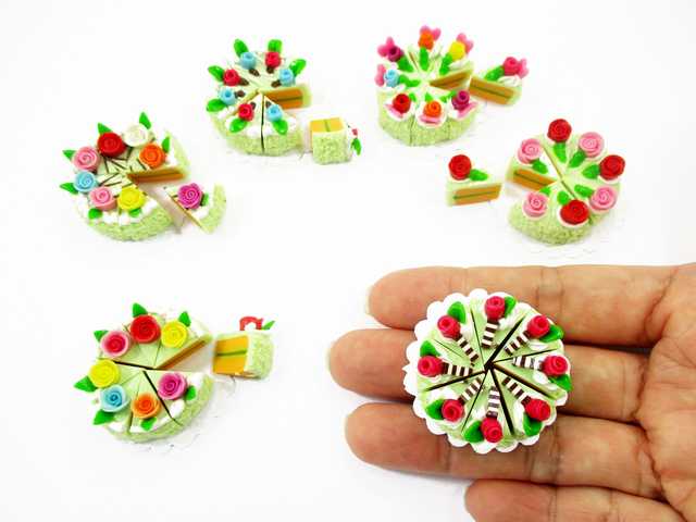 display handmade clay miniature slice cake with rose decorations, a present for dollhouse lovers